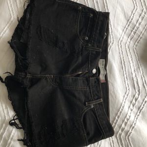 Levi’s Black distressed jean shorts